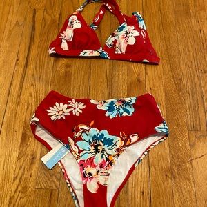 Never before worn women’s swimsuits with hygienic liner still intact.